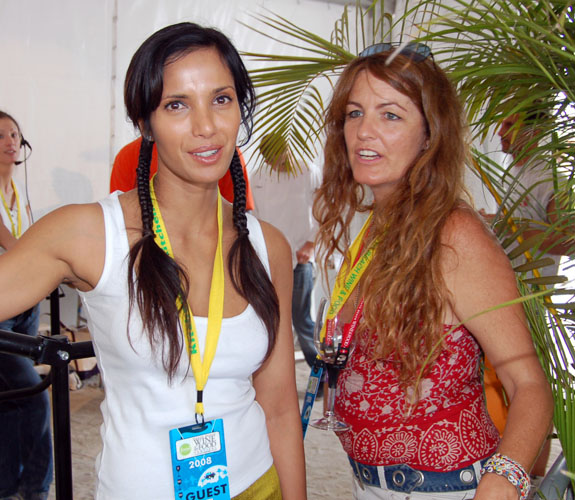 Reality television actress Padma Lakshmi poses with a fan during the South Beach Wine &amp Food Festival Grand Tasting.